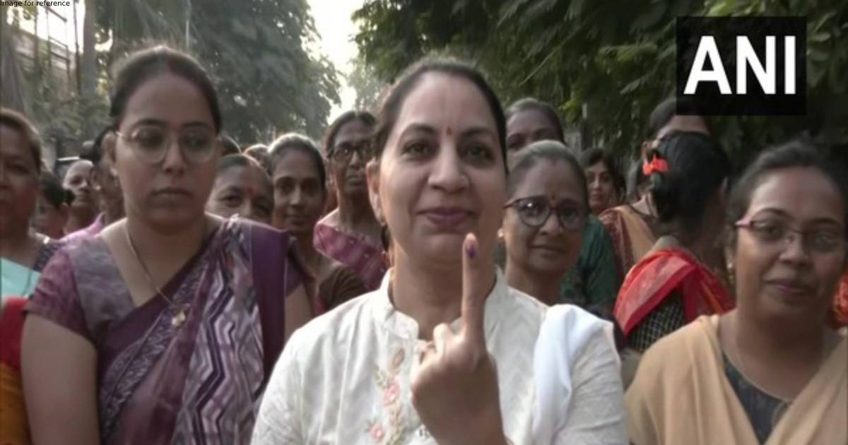 Gujarat Polls: Women voter cast vote at polling booth in Surat